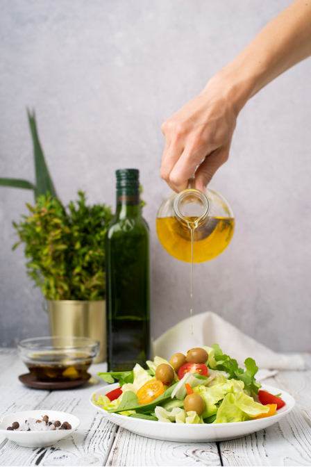 Sunflower oil poured on some salad plate